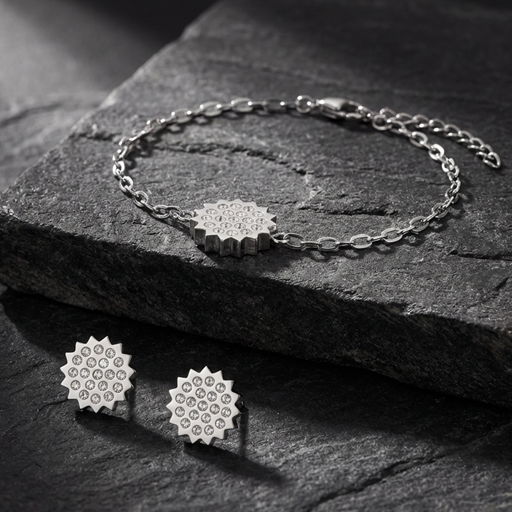 Komplet naušnica i delikatne svetlucave narukvice s-l